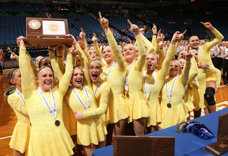 Chaska High School in custom yellow high kick dresses