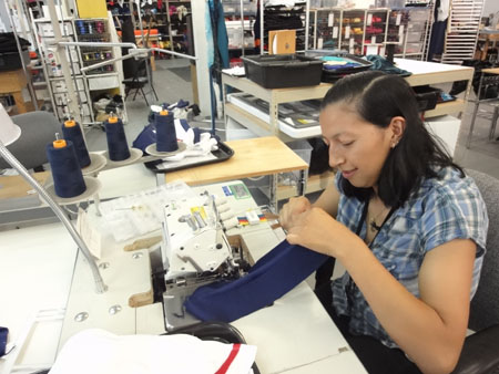 Gladys sewing the Washington Kastles Team Uniform