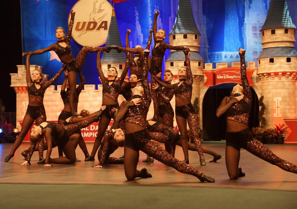West Fargo Dance Team, The Line Up, high kick, copper and black dance costume, edgy, animalistic, NDTC 2015 Nationals, UDA