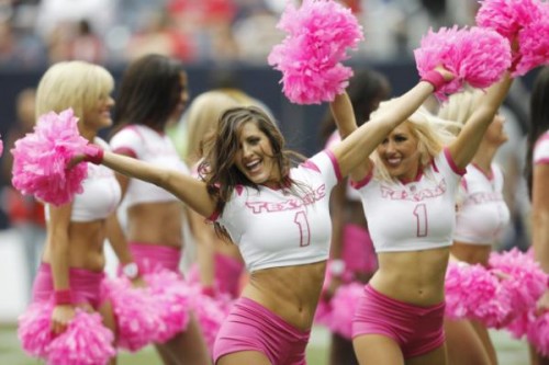 Texans dressed in pink uniforms, celebrating Breast Cancer Awareness