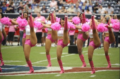 Texans in pink uniform kicking