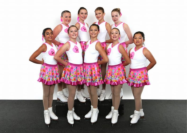 onyx synchronized skating team custom conversation heart themed skate dresses 