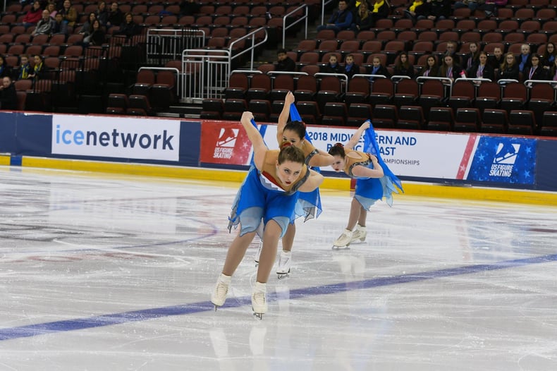 onyx synchronized skating team custom jaws themed skate dresses 