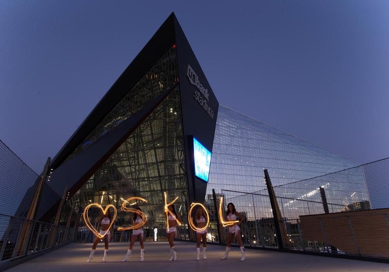 Minnesota Vikings Cheerleaders new uniform in front of US Bank stadium