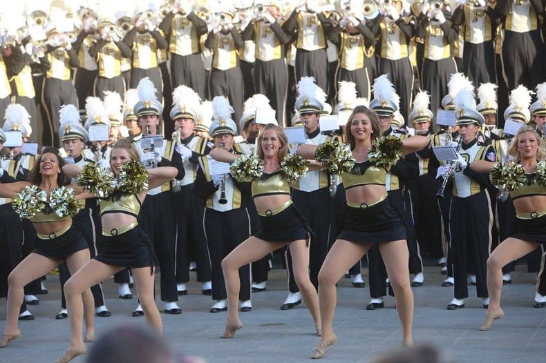 purdue golduster dance team with purdue marching band