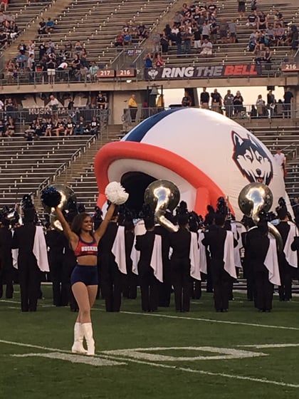 UCONN dance team on the footbal field